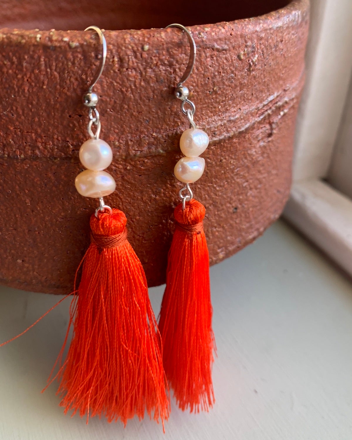 White Freshwater Pearl and Orange Tassel Earrings | Handmade in Myanmar - YGN Collective